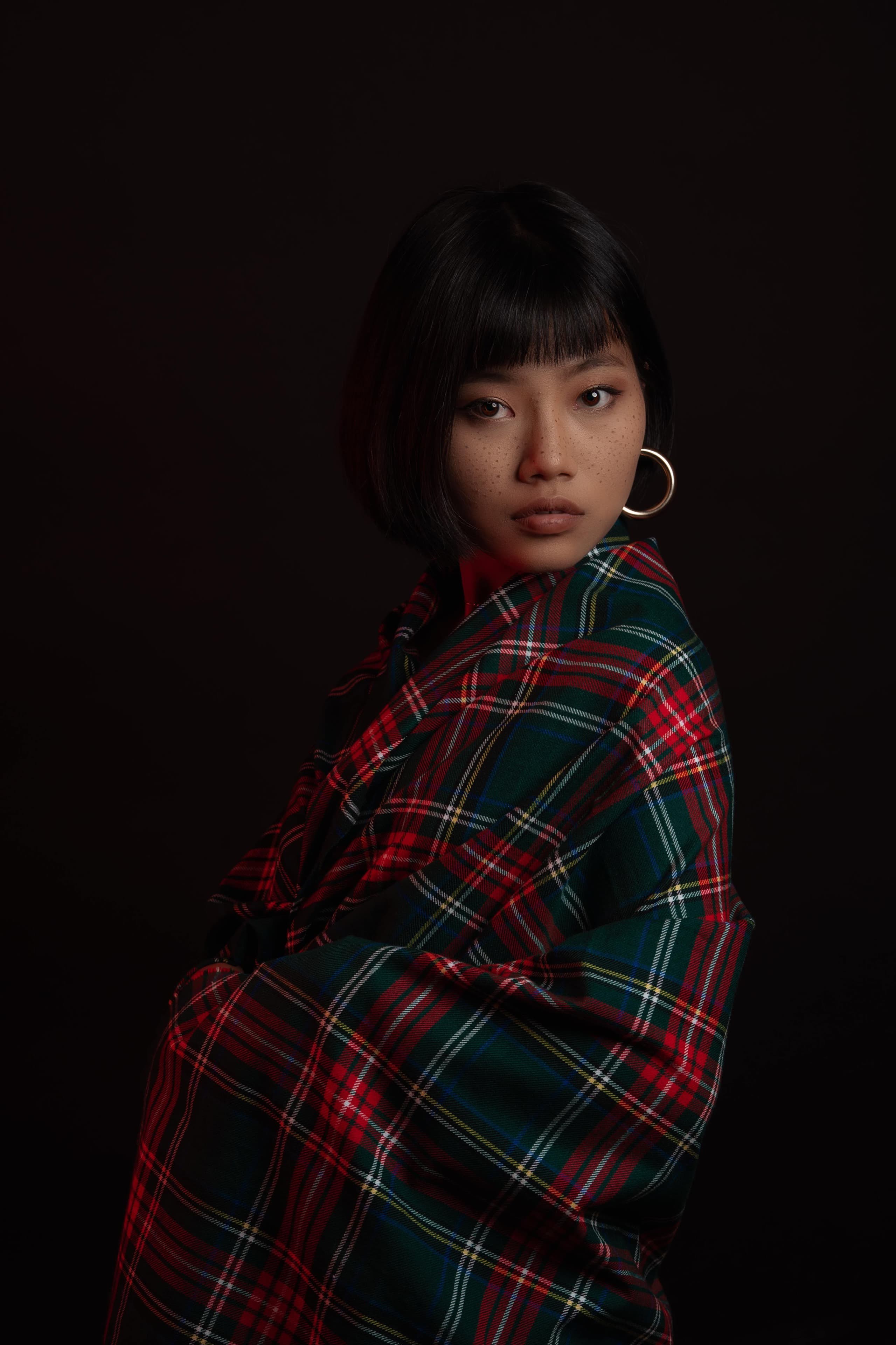 Editorial tartan portrait, side profile